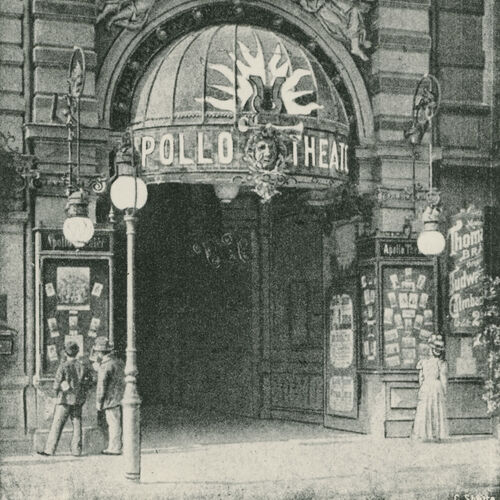A historical street scene showing the entrance to a theatre with a large arched canopy and the inscription APOLLO THEATRE, flanked by ornate street lamps and billboard cases.